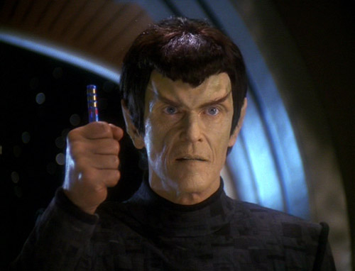 Romulan Senator Vreenak holding a counterfeit recording (DS9 543)